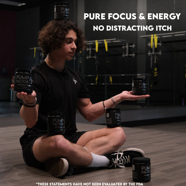 An image of a man sitting cross-legged with Pump Factor Energy Preworkout canisters balanced on his head, one in each hand, one on each knee, and one in front wearing a lack quick-drying performance t-shirt. Background is in a gym by the mirror.